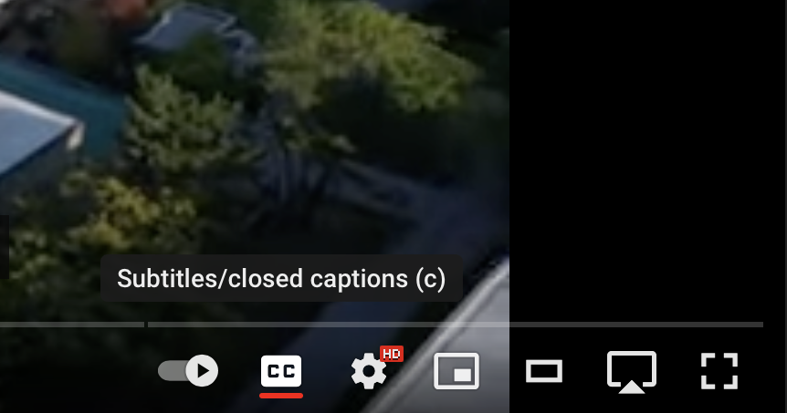 The YouTube player toolbar with the tooltip Subtitles/closed captions (c) above the CC button.