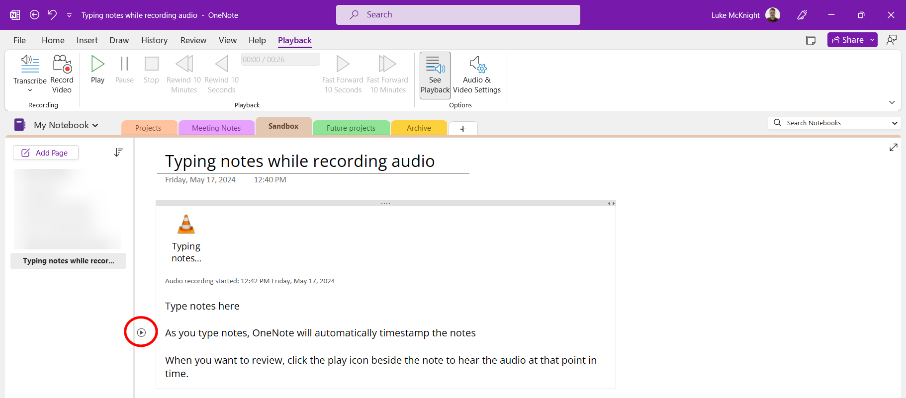 A OneNote page with the small play button circled to the left of a typed note.