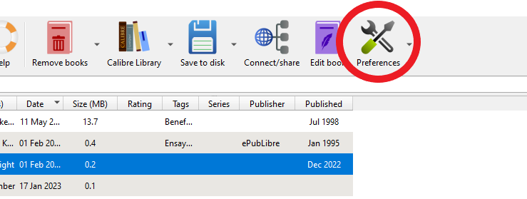 The Calibre toolbar with the Preferences button circled.
